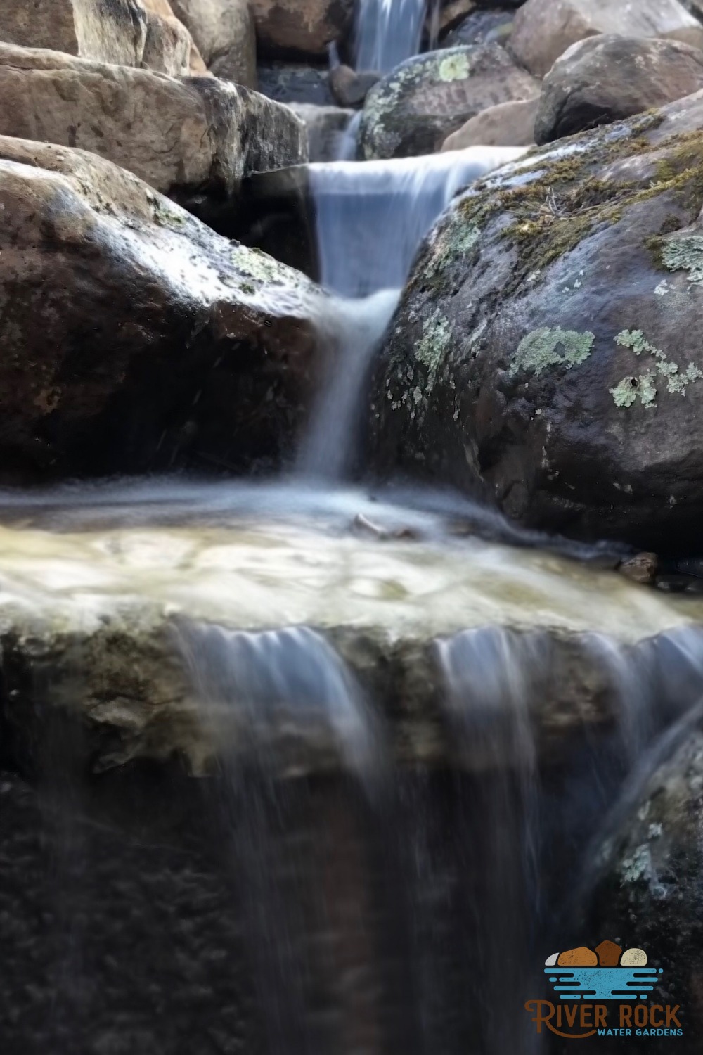 Waterfalls for backyard inspiration- Rogers Pond contractor